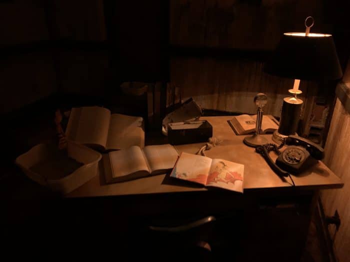 A teacher's desk within the walls of the school